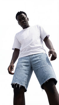 Unisex's loose-fit long denim shorts made from heavyweight, premium-quality denim. Designed with a relaxed silhouette for comfort and durability, featuring a unique design by Street Society.