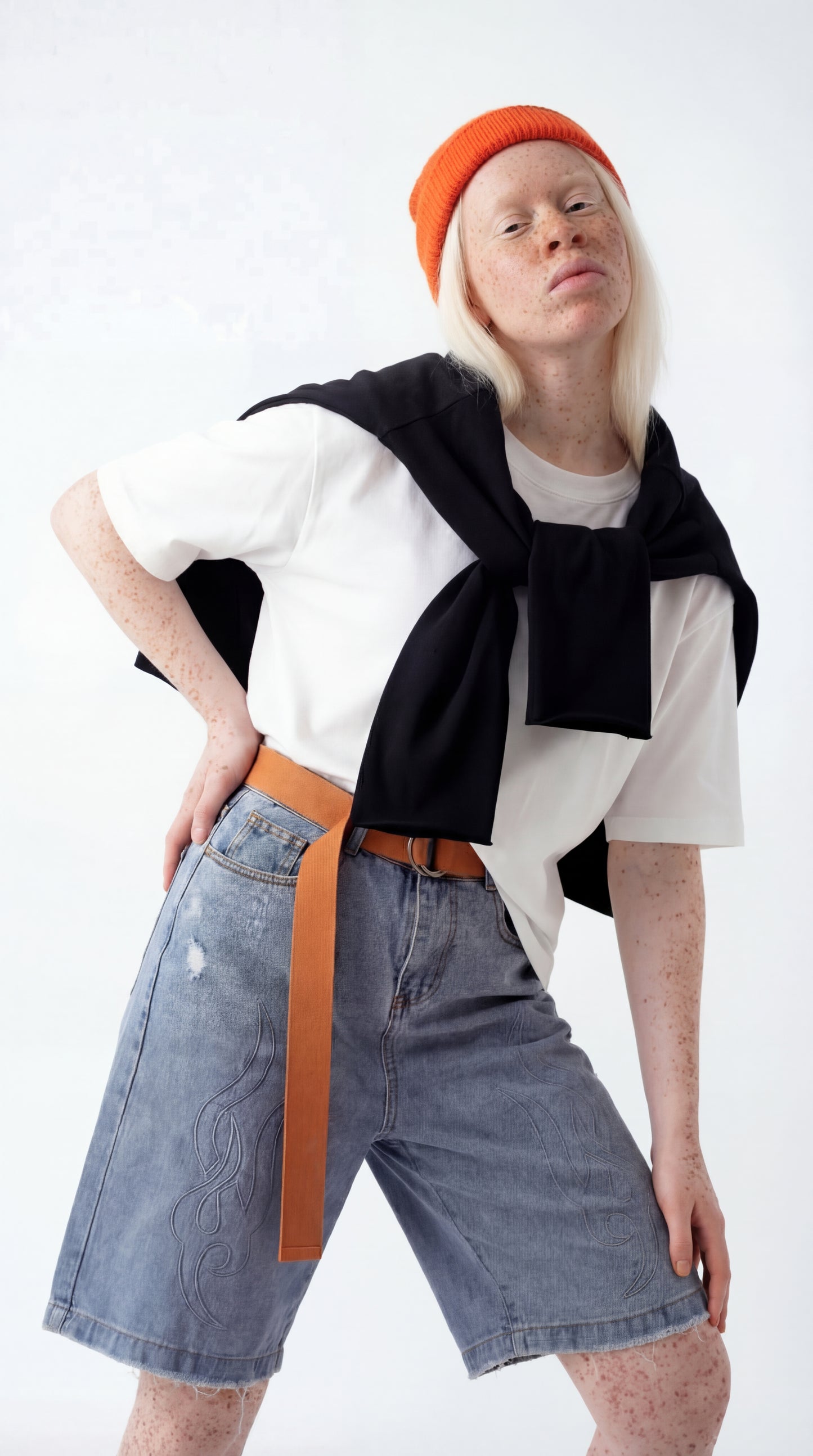 Unisex's loose-fit long denim shorts made from heavyweight, premium-quality denim. Designed with a relaxed silhouette for comfort and durability, featuring a unique design by Street Society.